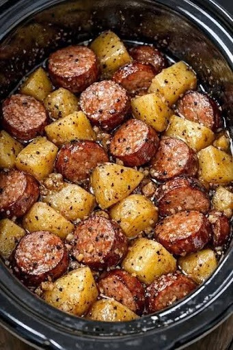 Slow Cooker Garlic Butter Sausage and Potatoes is a simple and flavorful one-pot meal that combines smoky sausage, tender potatoes, and rich garlic butter for maximum comfort