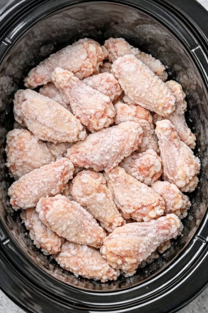 Dump frozen chicken wings Slow Cooker 3-Ingredient